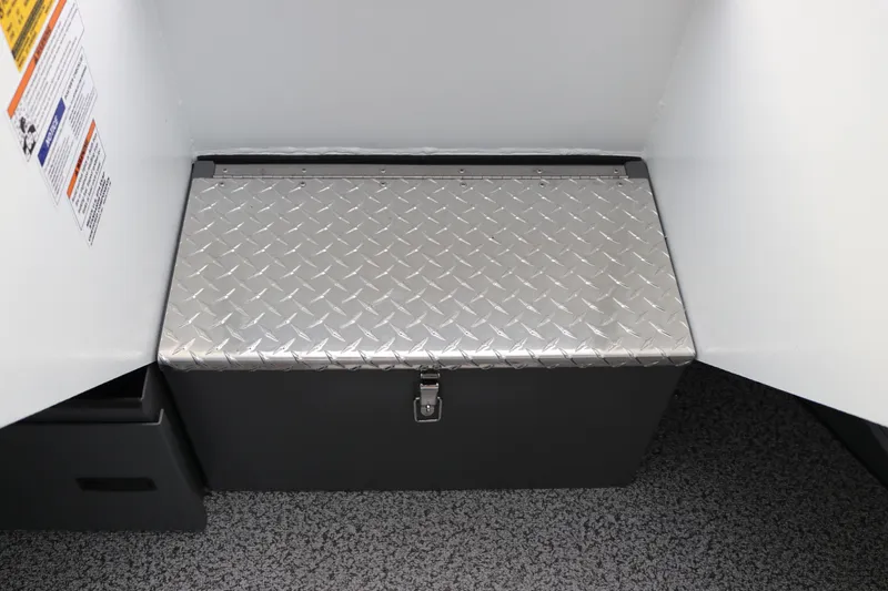 Slide: The Image of 2026 Alumaweld Intruder Outboard 22 storage compartment with diamond plate lid. - 34