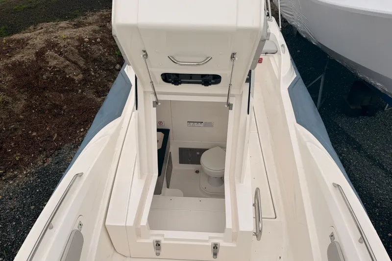 Slide: The Image of Interior of a 2022 Zar 79SL featuring a toilet. - 14