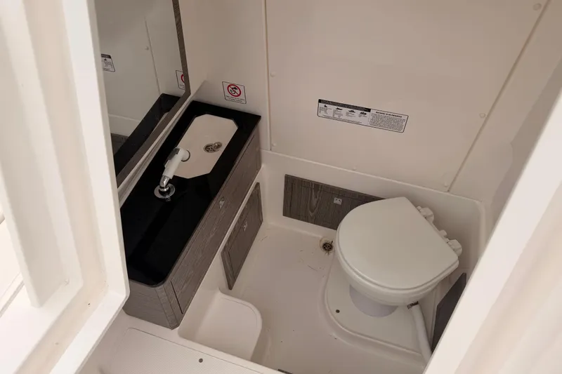Slide: The Image of Interior of Zar 79SL 2022 with toilet and sink. - 15