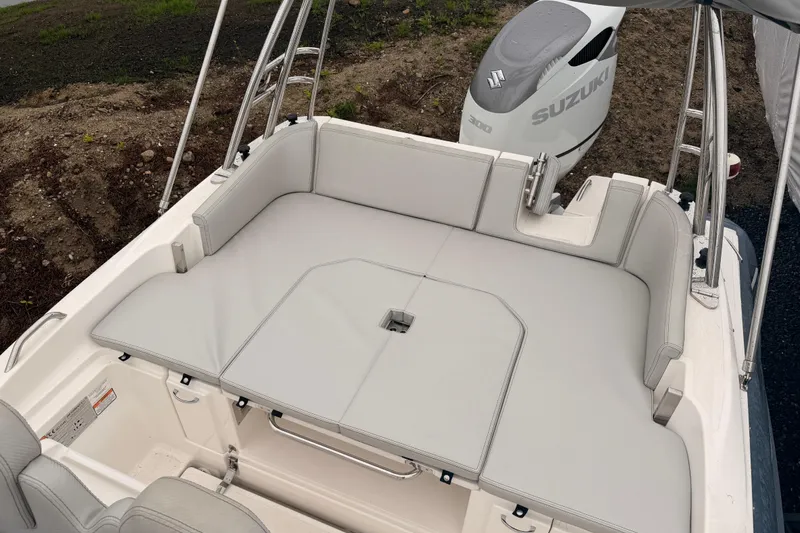 Slide: The Image of 2022 Zar 79SL boat with Suzuki engine, featuring spacious seating and sleek design. - 17