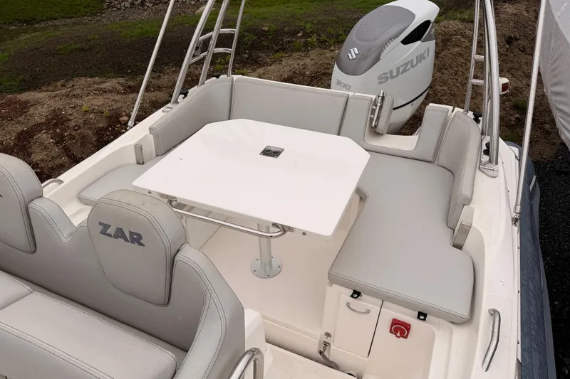 Slide: The Image of Interior of a 2022 Zar 79SL boat with Suzuki engine. - 18