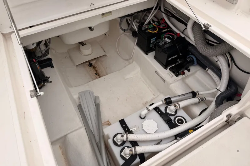 Slide: The Image of Interior view of 2022 Zar 79SL boat's engine compartment with equipment and wiring. - 20
