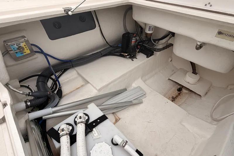 Slide: The Image of Interior view of a 2022 Zar 79SL boat showing storage and equipment. - 21