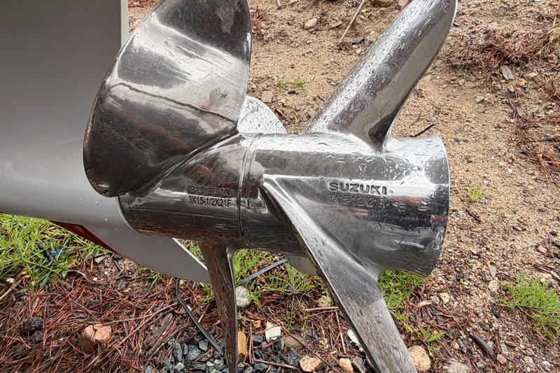 Slide: The Image of Close-up of a Suzuki boat propeller on a Zar 79SL 2022. - 23