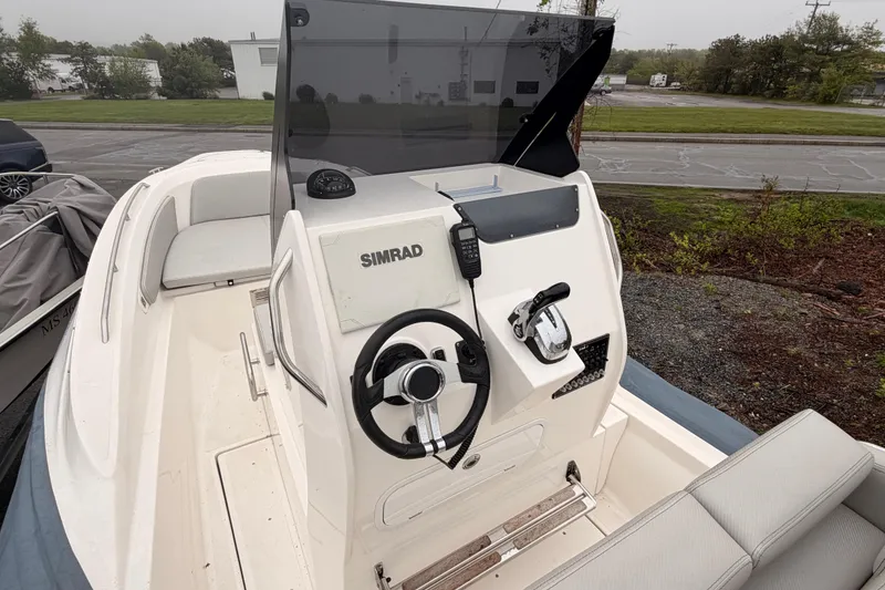 Slide: The Image of Interior view of 2022 Zar 79SL boat with helm console. - 9