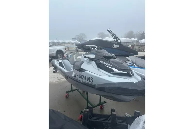 Slide: The Image of 2021 Sea-Doo GTX Limited 300 jet ski on a foggy day at the marina. - 3