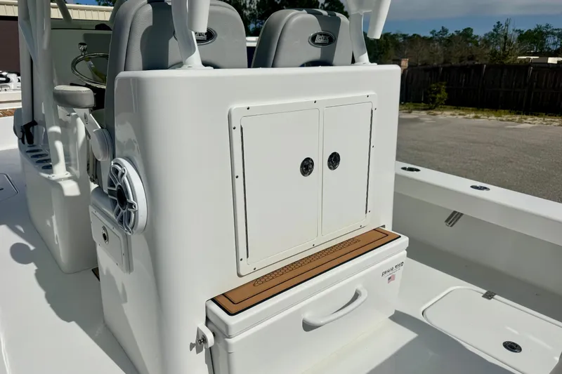Slide: The Image of 2023 ZCB Freemason 26 boat interior with storage compartments and seating. - 10