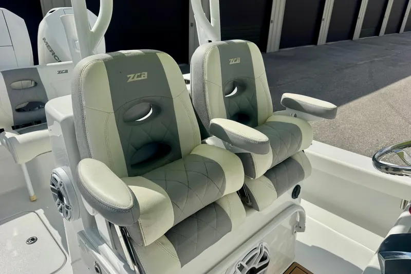 Slide: The Image of 2023 ZCB Freemason 26 boat seats with armrests, featuring a modern design and comfortable upholstery. - 8