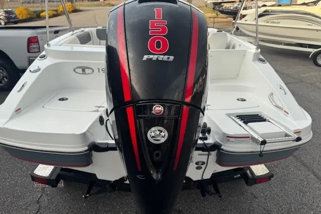 Slide: The Image of Rear view of a 2018 Tahoe 1950 boat with a 150 Pro outboard motor. - 5