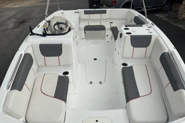 Slide: The Image of Interior of a 2018 Tahoe 1950 boat with spacious seating and modern design. - 8