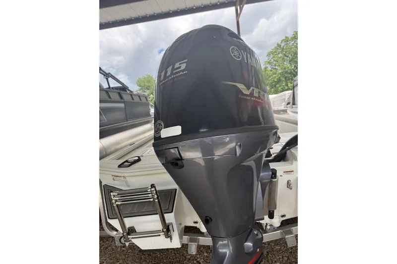 Slide: The Image of 2024 Avid 21 FST boat with Yamaha 115 VMAX outboard motor. - 7