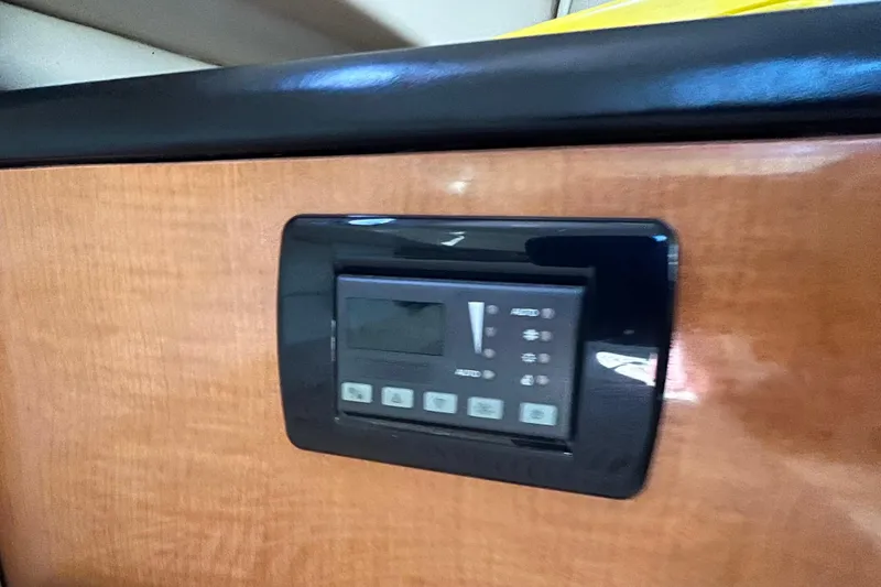 Slide: The Image of Control panel on 2007 Robalo R305 Walkaround boat interior. - 20