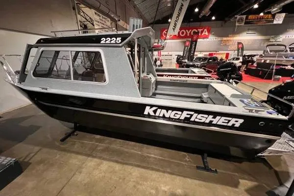 Slide: The Image of 2025 KingFisher 2225 Escape HT boat displayed at an indoor exhibition. - 3