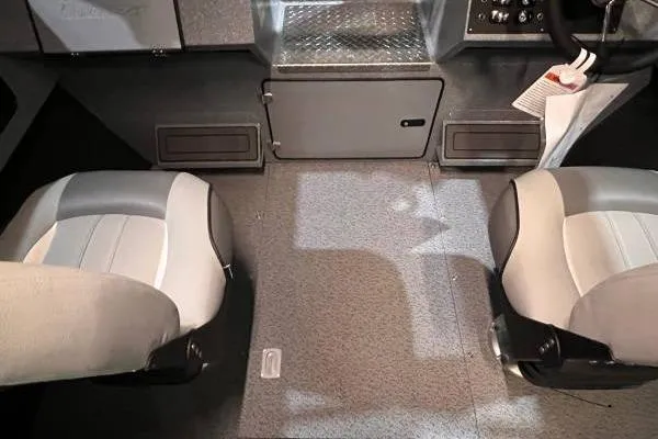 Slide: The Image of Interior of 2025 KingFisher 2225 Escape HT boat with two seats and control panel. - 8