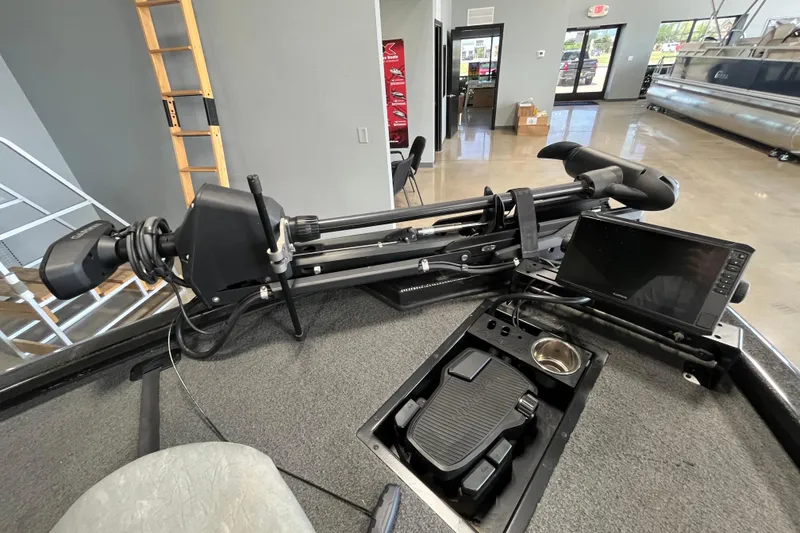 Slide: The Image of 2024 Avid 19 XB boat interior with trolling motor and navigation display. - 4