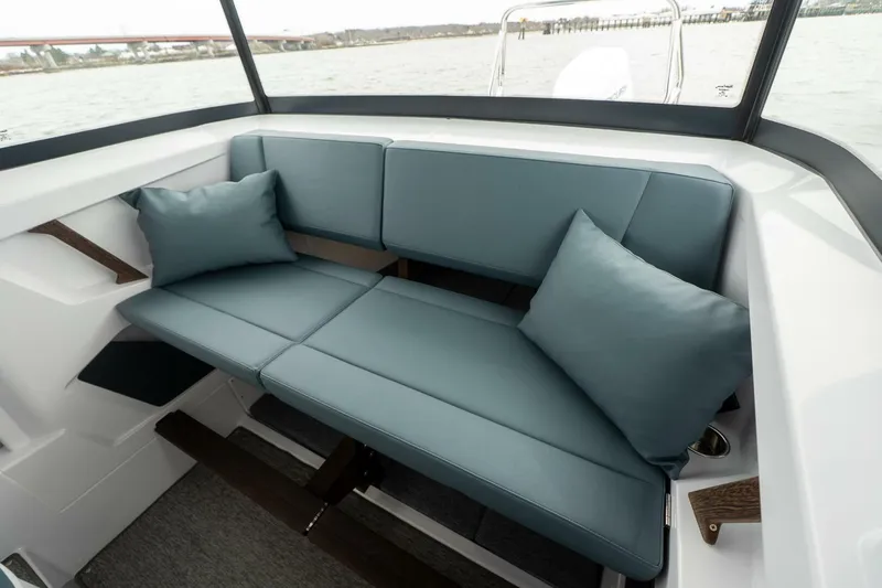 Slide: The Image of Luxurious seating in the 2026 Axopar 29 XC Cross Cabin boat interior. - 26