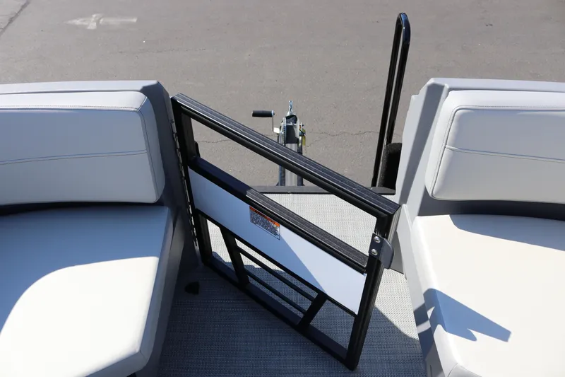 Slide: The Image of 2025 SunChaser Lucerne 20 LR DH boat interior with open gate and seating. - 20