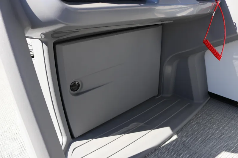 Slide: The Image of Storage compartment on 2025 SunChaser Lucerne 20 LR DH boat, featuring sleek gray design. - 26
