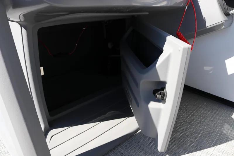 Slide: The Image of Open storage compartment on 2025 SunChaser Lucerne 20 LR DH boat. - 27