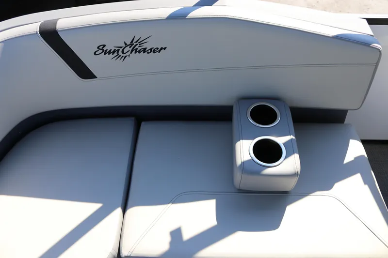 Slide: The Image of SunChaser Lucerne 20 LR DH 2025 boat seat with dual cup holders. - 29