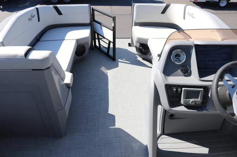 Slide: The Image of 2025 SunChaser Lucerne 20 LR DH pontoon boat interior with modern seating and helm. - 9