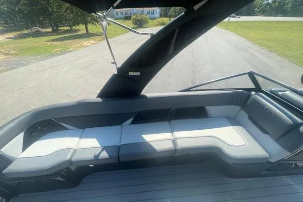 Slide: The Image of 2023 Veranda V One 25 boat interior with sleek seating and modern design. - 6