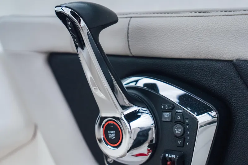 Slide: The Image of Throttle control of 2024 Sea Ray SPX 210 Outboard boat, featuring start/stop button. - 15