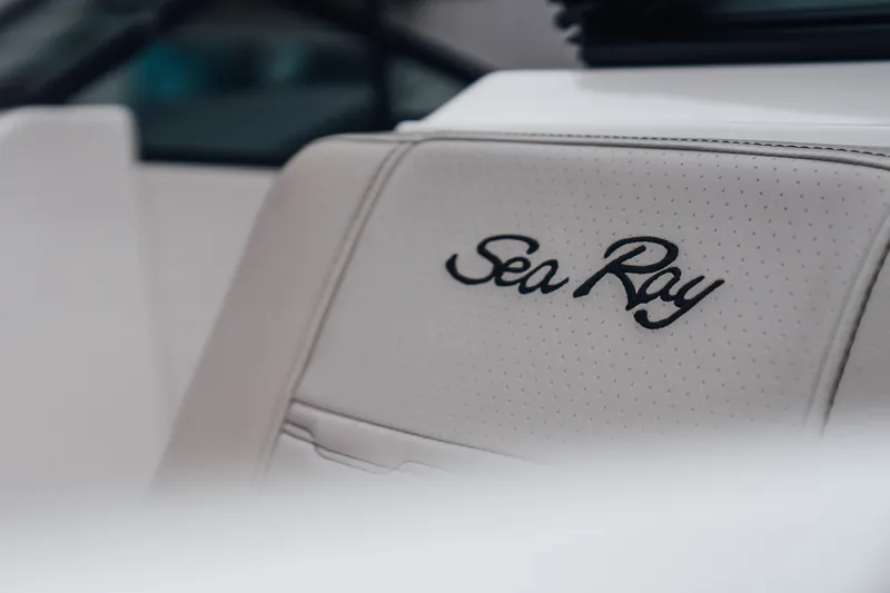 Slide: The Image of 2024 Sea Ray SPX 210 Outboard boat seat with embroidered logo. - 6