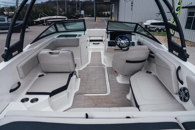 Slide: The Image of 2024 Sea Ray SPX 210 Outboard boat interior with spacious seating and modern design. - 9