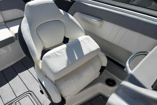 Slide: The Image of 2023 Chaparral 21 SSi boat interior with white seating and modern design. - 31