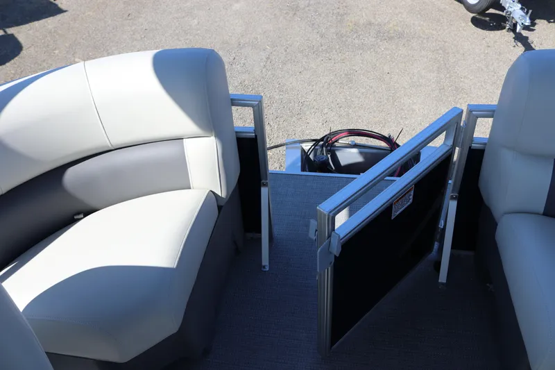Slide: The Image of Interior view of 2025 SunChaser Vista 18 LR pontoon boat with seating and open gate. - 15