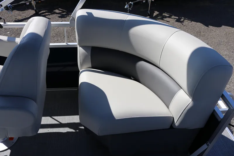 Slide: The Image of Luxurious seating on 2025 SunChaser Vista 18 LR pontoon boat, featuring sleek design and comfort. - 16