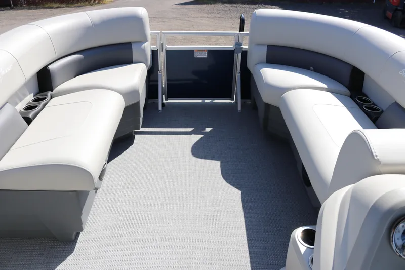 Slide: The Image of Spacious interior of 2025 SunChaser Vista 18 LR pontoon boat with comfortable seating. - 6