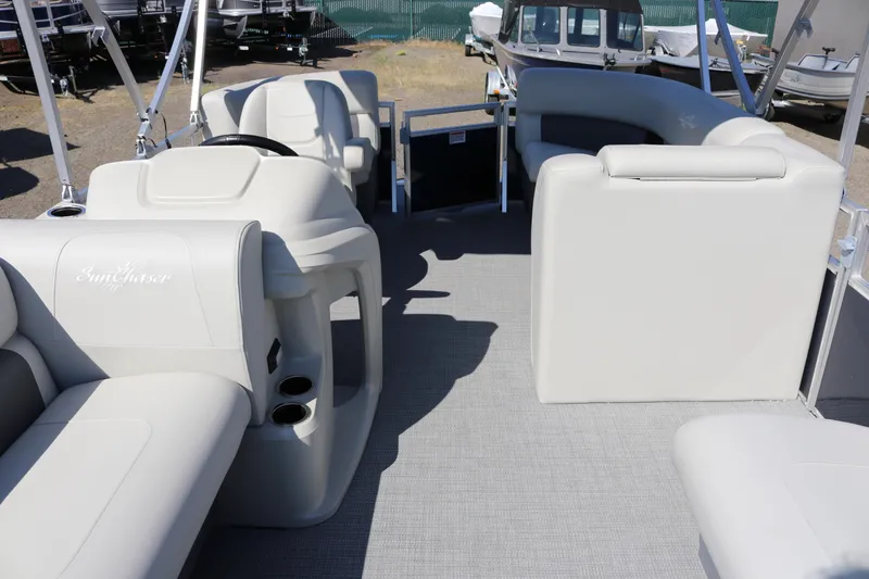 Slide: The Image of Interior of 2025 SunChaser Vista 18 LR pontoon boat with plush seating. - 8