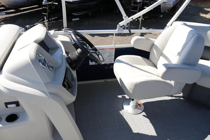 Slide: The Image of Captain's chair and helm of 2025 SunChaser Vista 18 LR pontoon boat. - 9