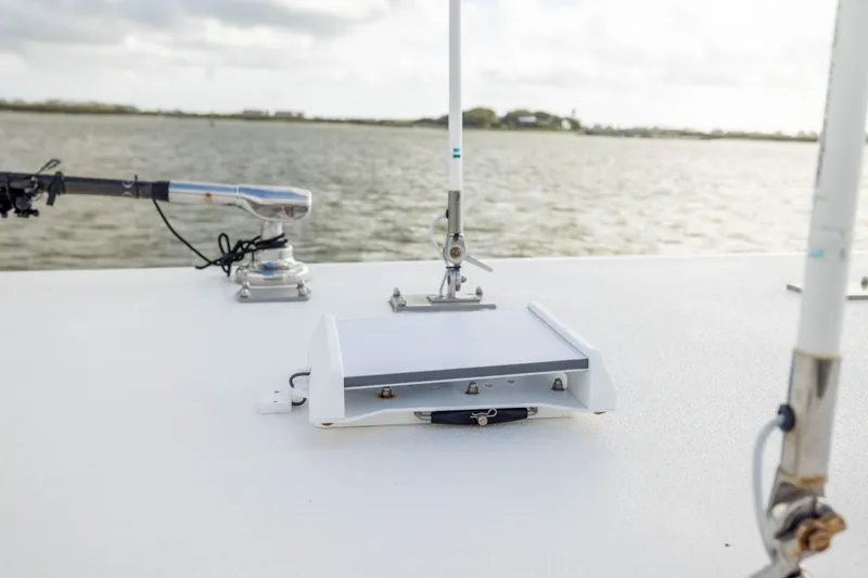 Slide: The Image of 2024 Invincible 35 Catamaran deck with fishing rod holders and equipment. - 17