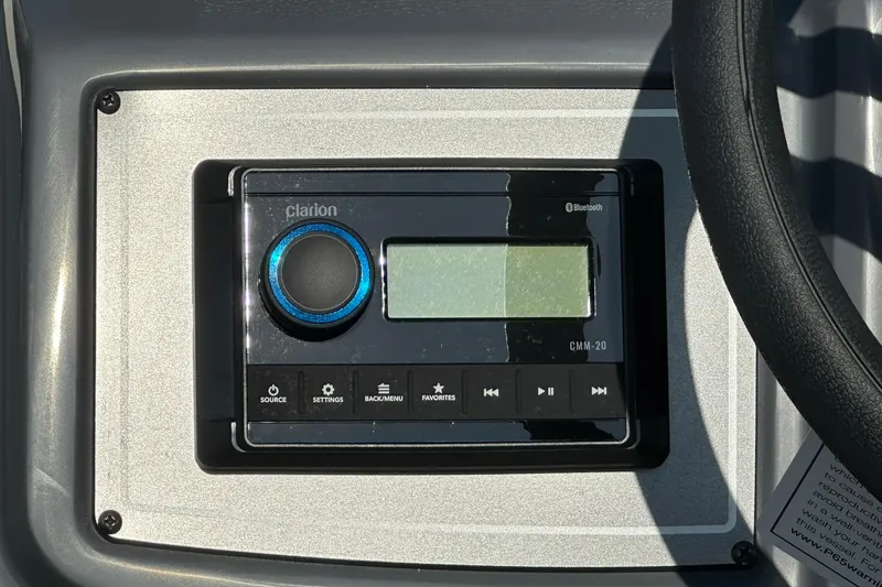 Slide: The Image of Clarion audio system on 2026 Hurricane FunDeck 1960 REF OB boat dashboard. - 15