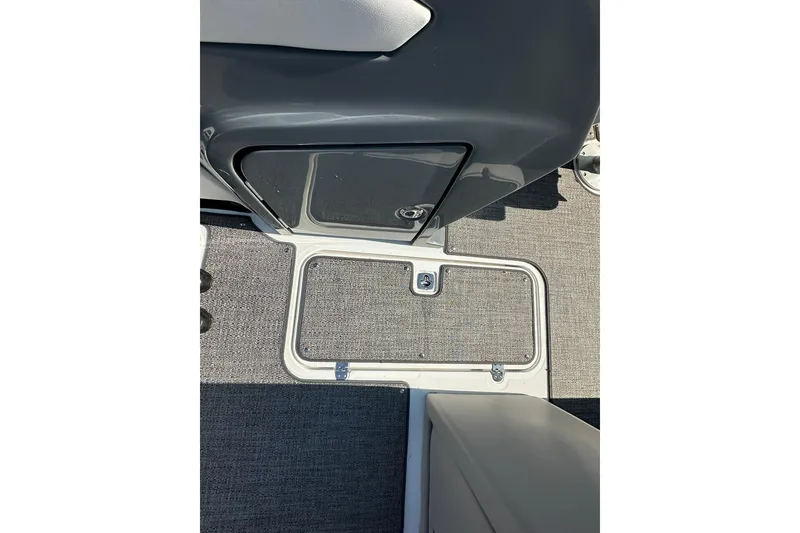 Slide: The Image of 2026 Hurricane FunDeck 1960 REF OB boat deck with storage compartment. - 27