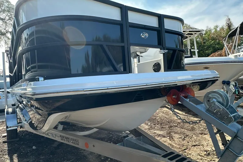 Slide: The Image of 2026 Hurricane FunDeck 1960 REF OB boat on trailer, side view. - 3