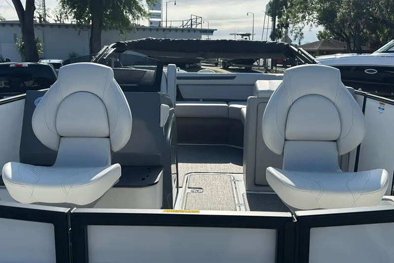 Slide: The Image of 2026 Hurricane FunDeck 1960 REF OB interior with plush seating and modern design. - 5