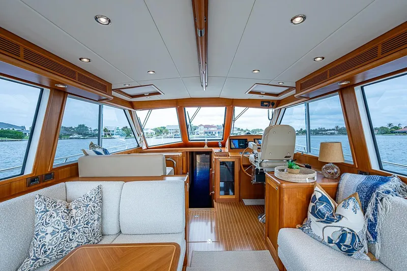 Slide: The Image of Luxurious interior of 2014 Grand Banks 46 Eastbay SX yacht with elegant wood finishes. - 22
