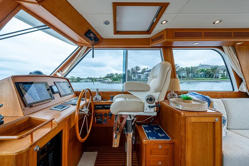 Slide: The Image of Luxurious helm of 2014 Grand Banks 46 Eastbay SX yacht with panoramic windows. - 3