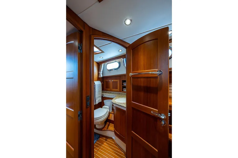 Slide: The Image of Luxurious wooden bathroom interior on 2014 Grand Banks 46 Eastbay SX yacht. - 37