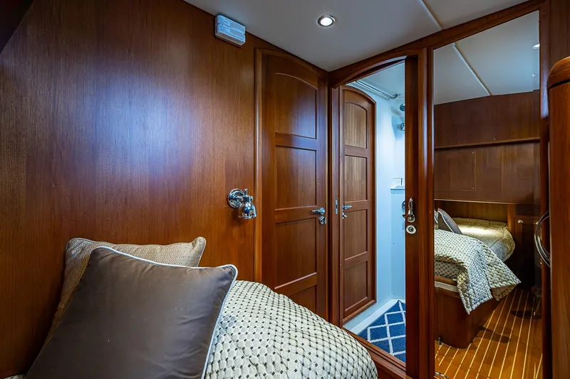 Slide: The Image of Luxurious cabin interior of 2014 Grand Banks 46 Eastbay SX yacht with wooden finish. - 43