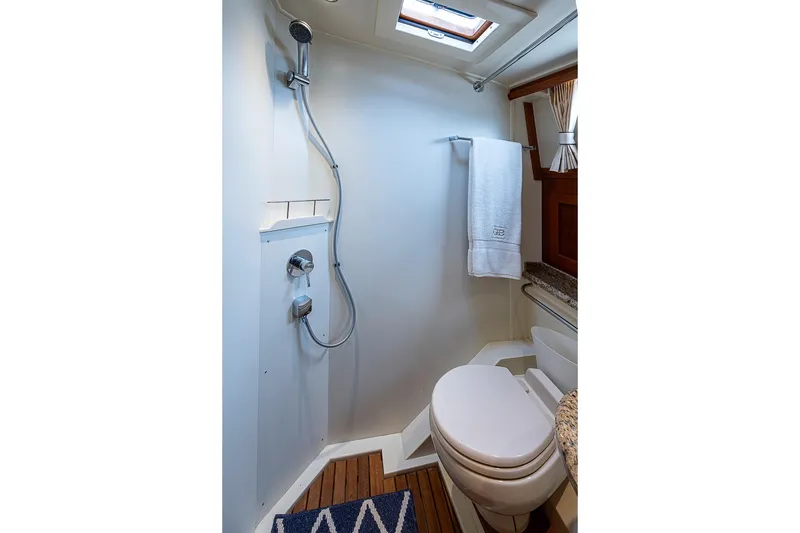 Slide: The Image of Bathroom interior of 2014 Grand Banks 46 Eastbay SX yacht with shower and toilet. - 45