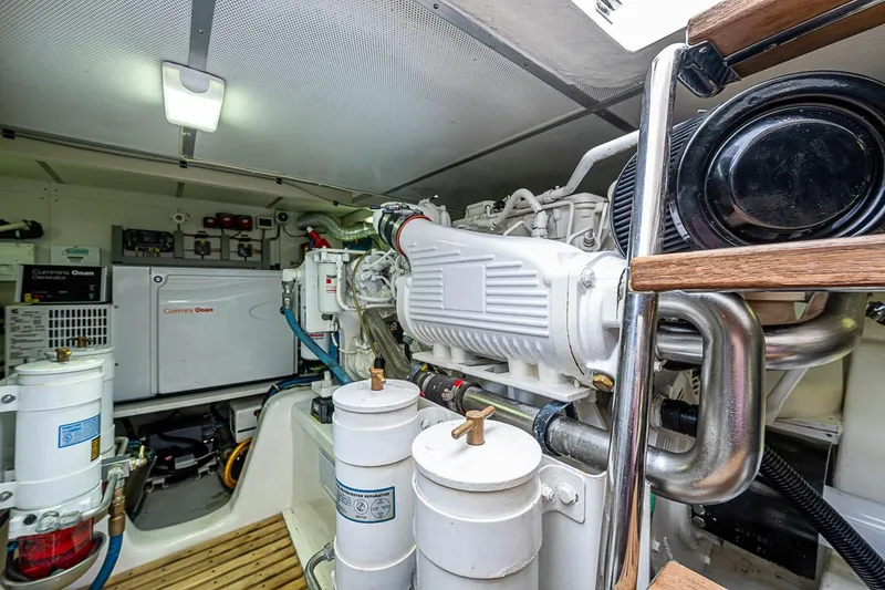 Slide: The Image of Engine room of 2014 Grand Banks 46 Eastbay SX with Cummins Onan generator. - 58