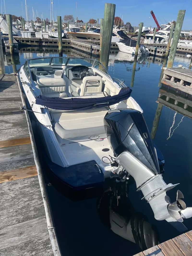 Slide: The Image of 2021 Cobalt SC23 OB boat docked in marina. - 4