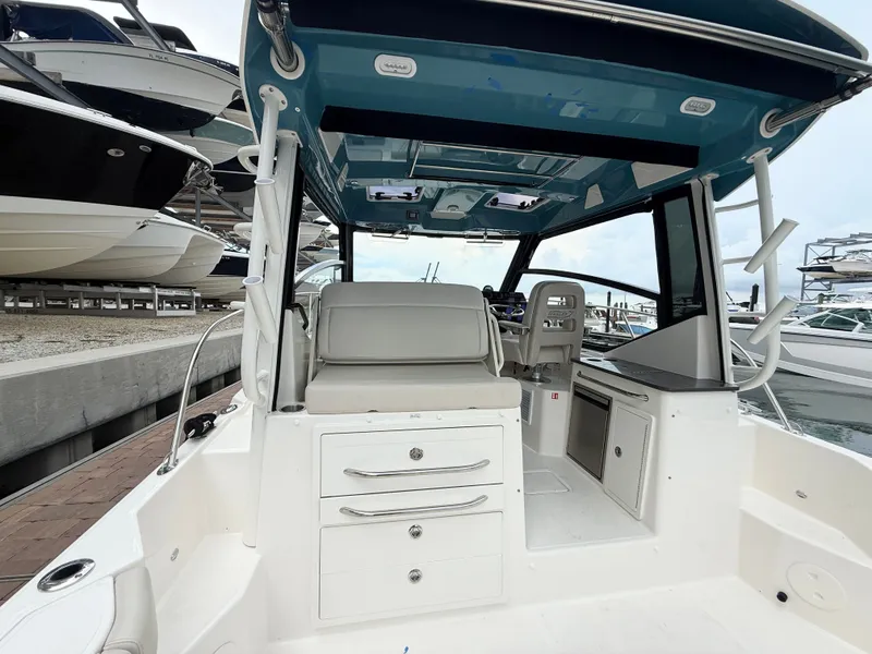 Slide: The Image of Boston Whaler 325 Conquest 2027 - 27