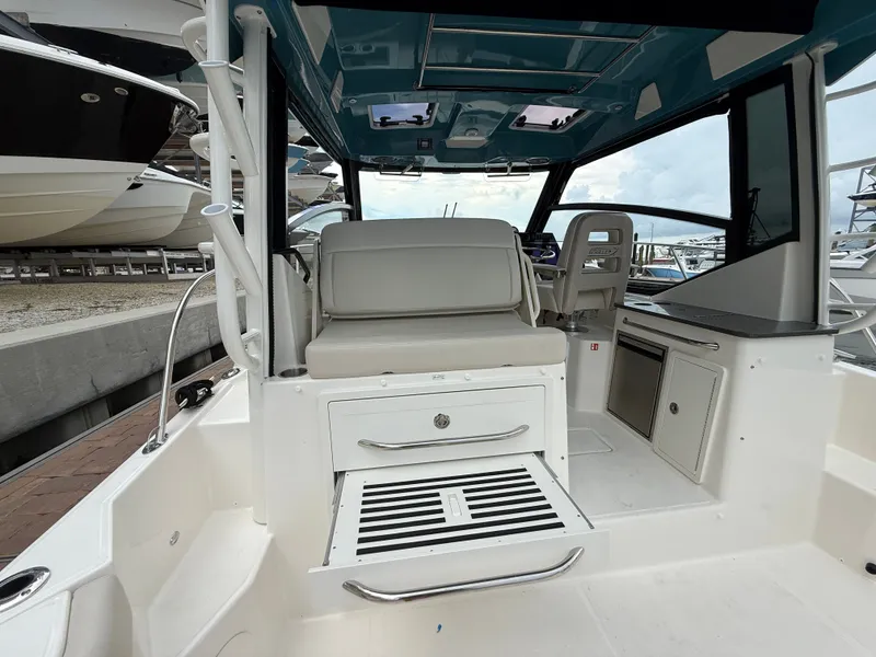 Slide: The Image of Boston Whaler 325 Conquest 2027 - 30