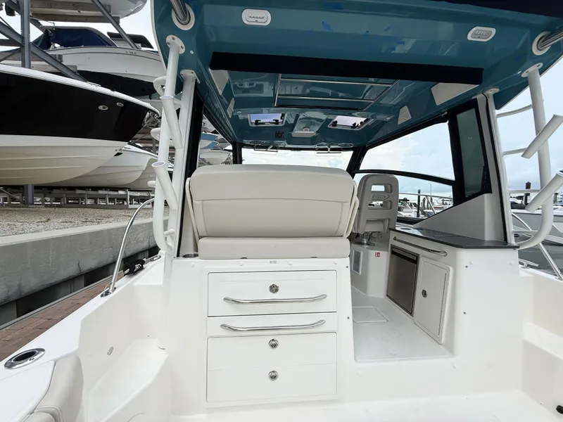 Slide: The Image of Boston Whaler 325 Conquest 2027 - 26